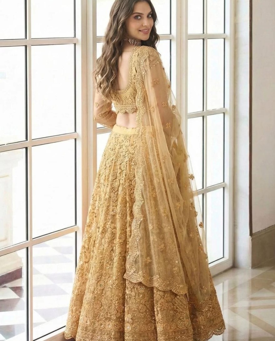 GOLDEN - Affectionate Gold Net Lehenga Choli