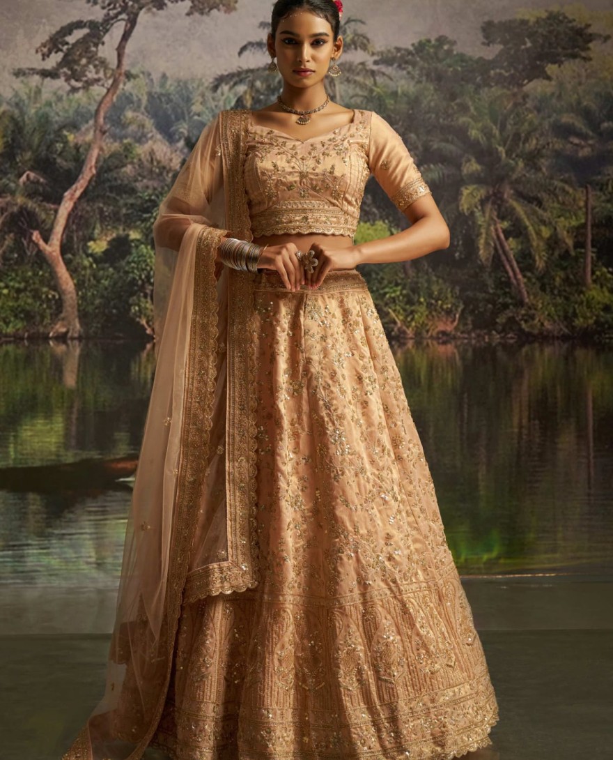 100005 - Tantalizing Peach Net Sequins Embroidered Traditional Lehenga Choli