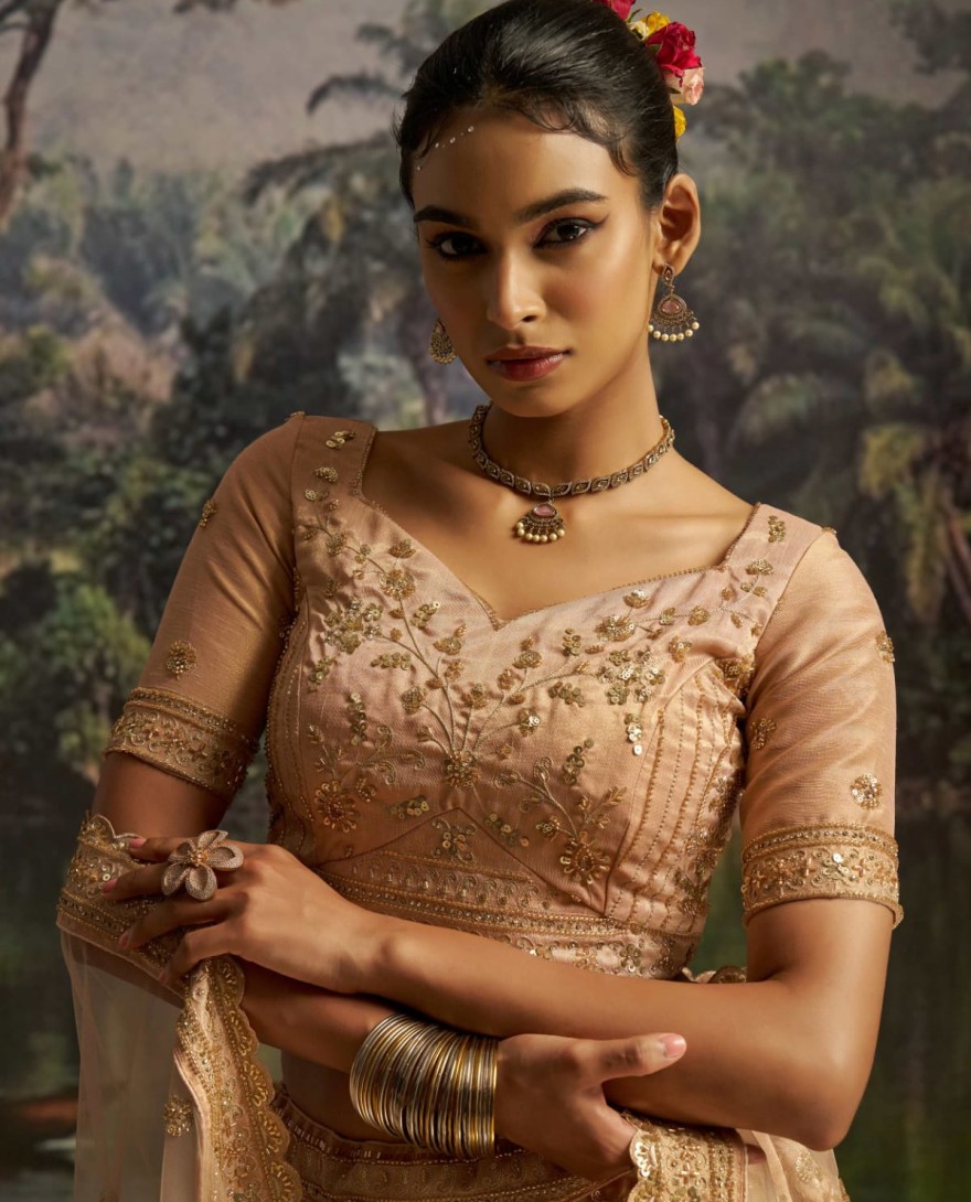 100005 - Tantalizing Peach Net Sequins Embroidered Traditional Lehenga Choli