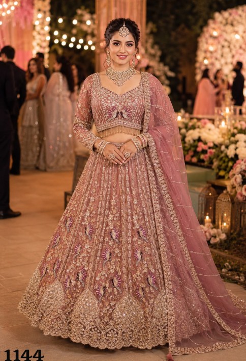 Beads, Diamond, Embroidered and Zari Work Net Lehenga Choli In Pink Colour