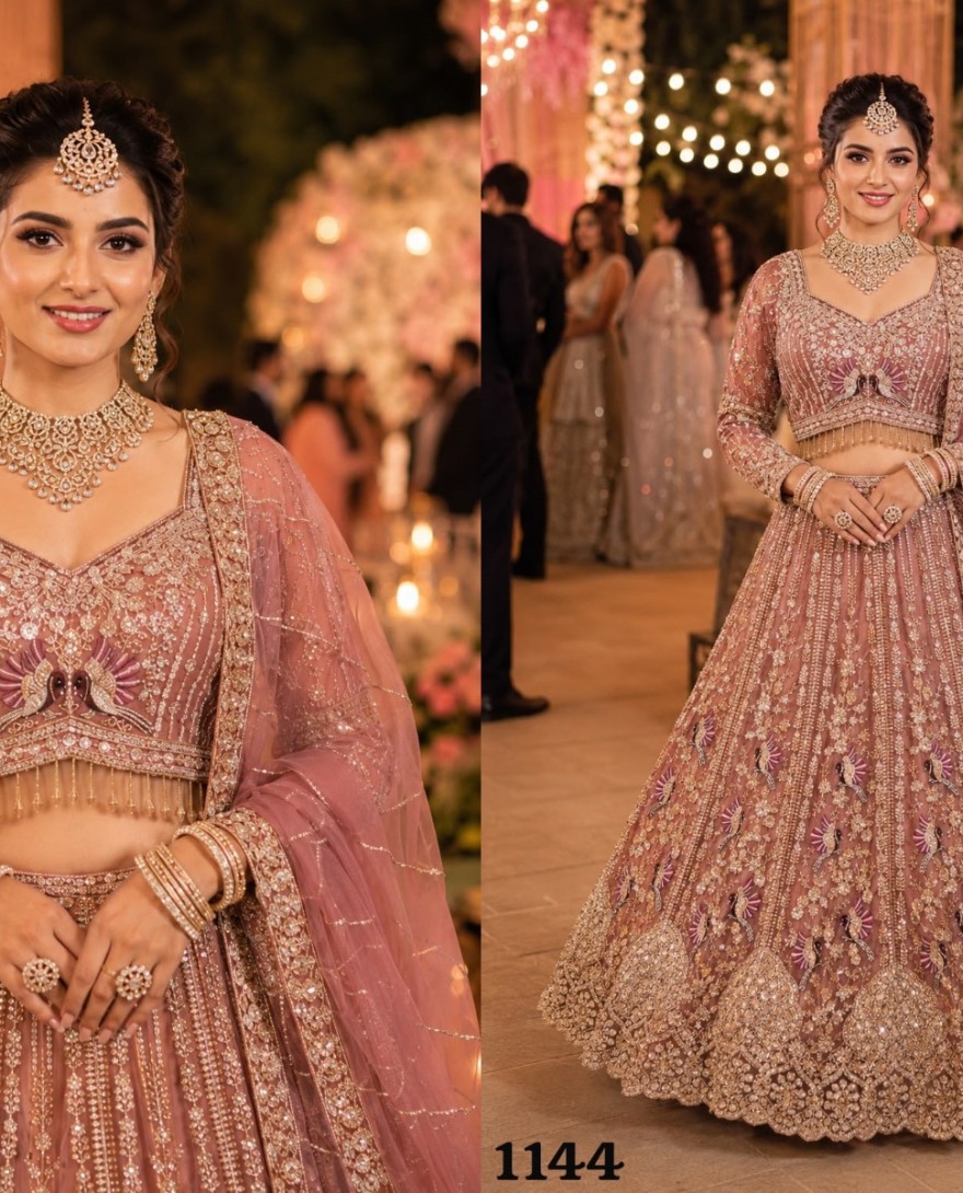PINK - Beads, Diamond, Embroidered and Zari Work Net Lehenga Choli In Pink Colour