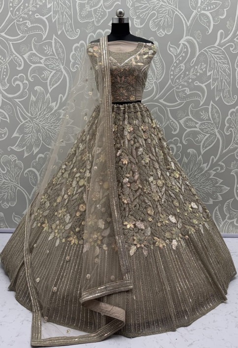 Eye-Catchy  Golden Lehengacholi studded with zircon diamond and Full of Sequins work 