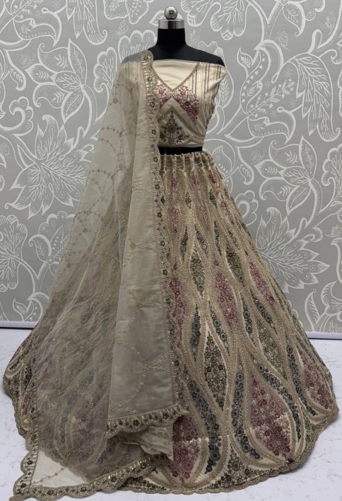 Abstinent Golden Art of Work with Detailed Thread work Designer LehengaCholi perfect for reception wear