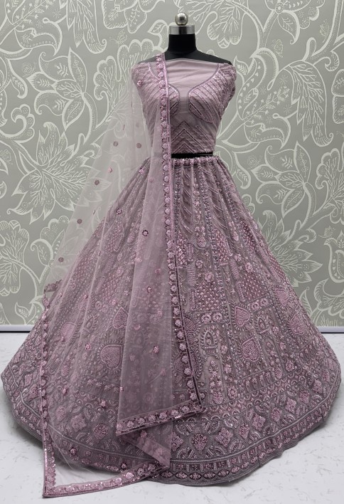 Sober Handwork Pink Motif and Crystal Pipe work Designed Reception Wear Collection in Lehenga Choli