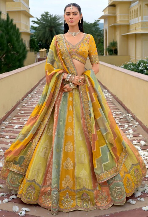 Sage Green And Mustard Silk Lehenga With Cut Work Border And Embroidery