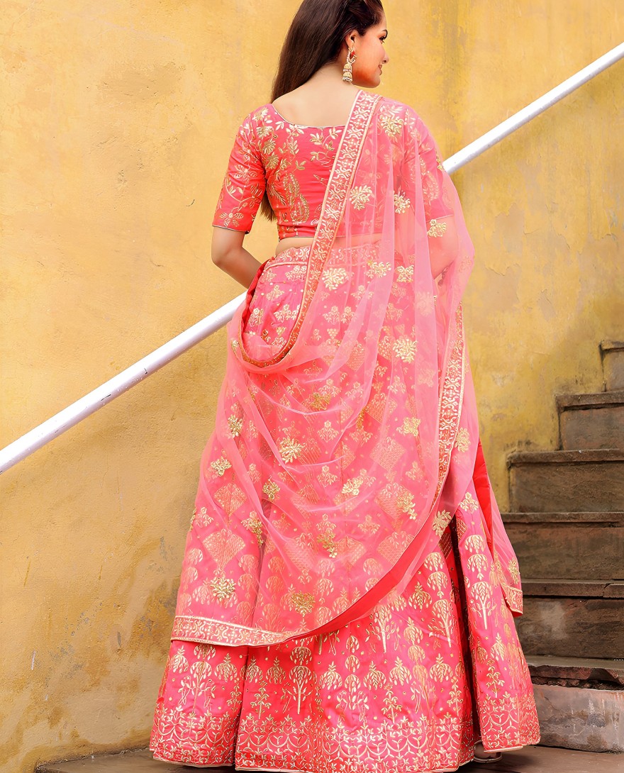 17812 - Bewitching peach embroidered silk wedding lehenga choli with dupatta