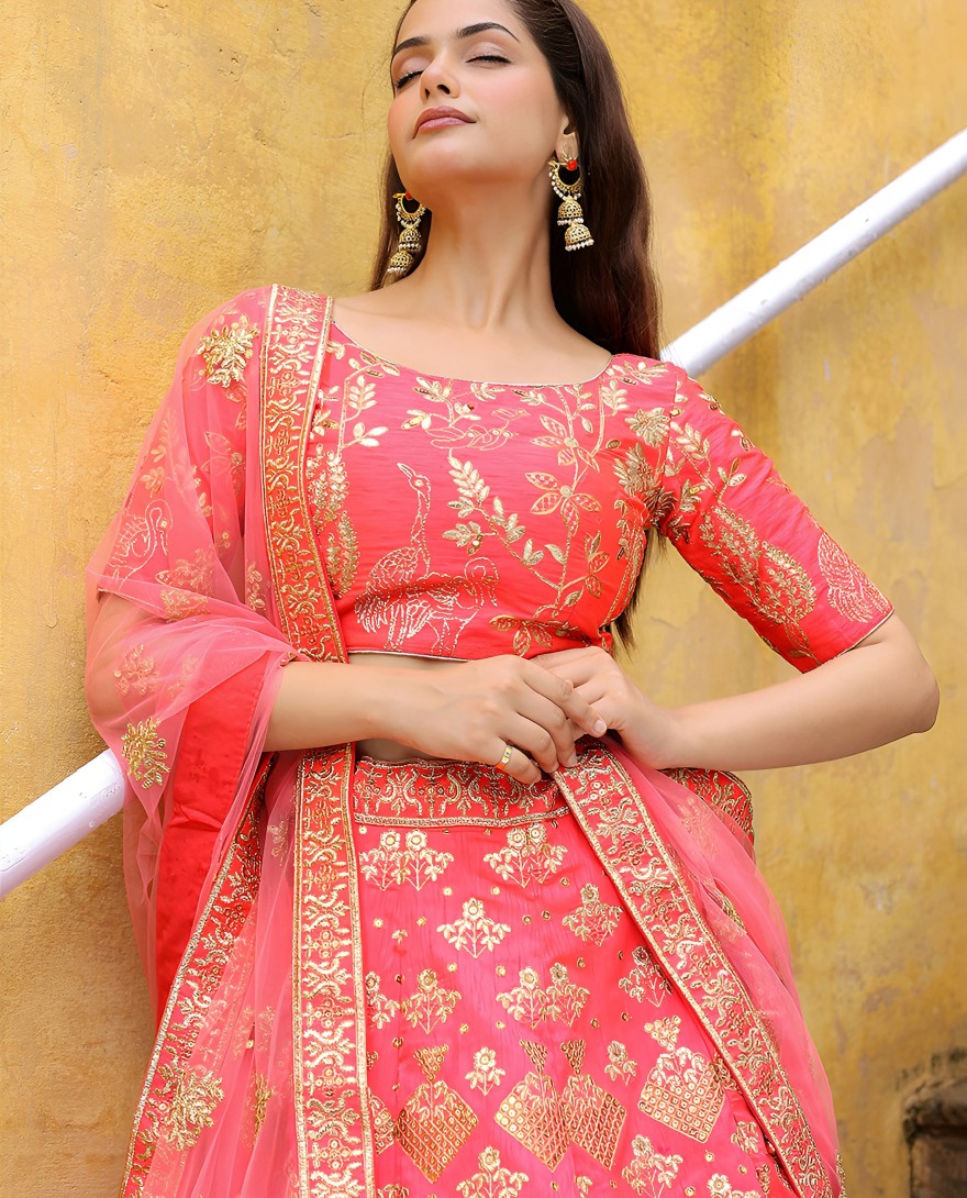 17812 - Bewitching peach embroidered silk wedding lehenga choli with dupatta